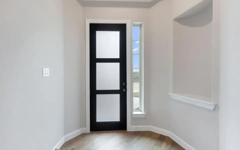 Representative unfurnished interior of a home built from the Santa Barbara by CastleRock Communities in Lakesong, Grand Prairie (Image 10).