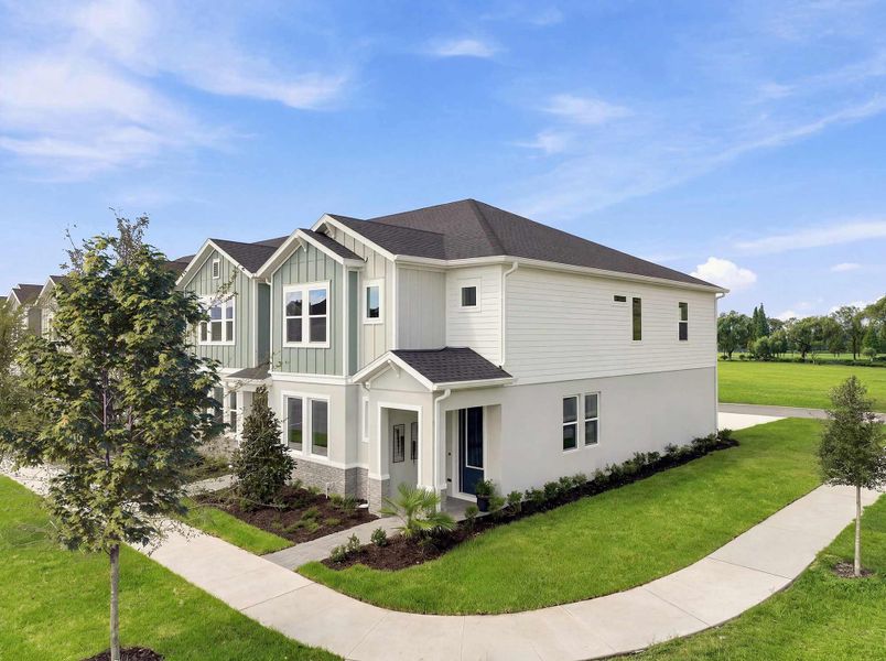 Representative exterior photo of a completed home built from the The Darwin by David Weekley Homes in Palmeras at Crossprairie – The Palms Collection, St. Cloud, FL (Image 10).