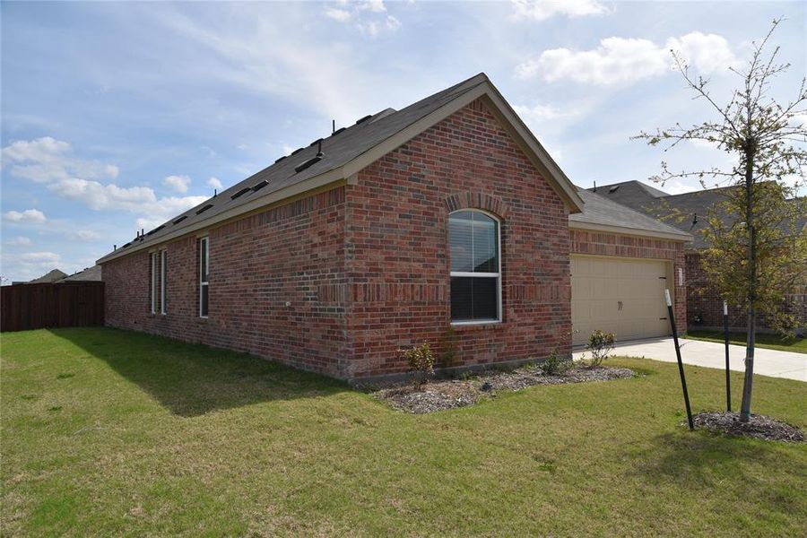Exterior details and patio area of a home in Walden Pond, Forney (Image 3).
