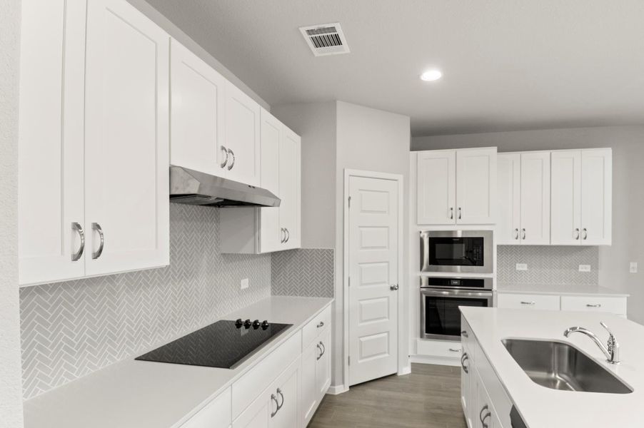 Furnished interior view inside a new home in Oaks at San Gabriel, Georgetown (Image 7).