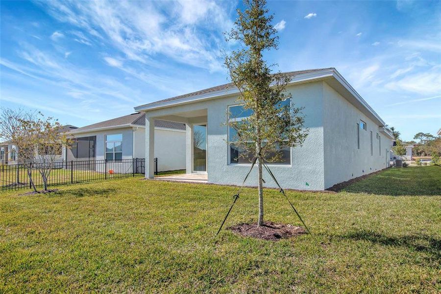 Exterior details and patio area of a home in The Reserve at Victoria, Deland (Image 4). Exterior details and patio area of a home in The Reserve at Victoria, Deland (Image 4).