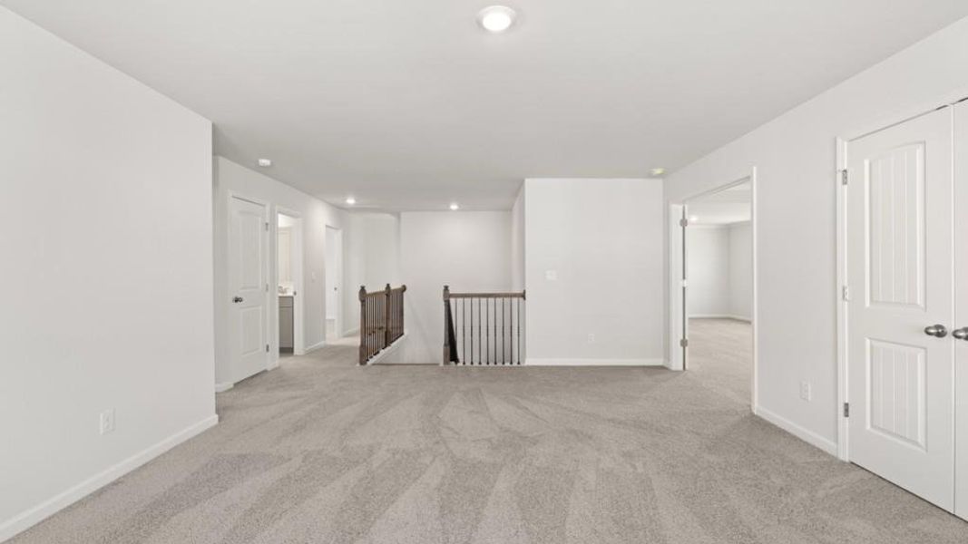 Spacious, unfurnished interior of a new home in Hamptons at Riverwood East, Dallas (Image 19).