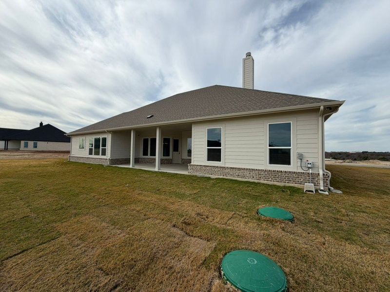 Exterior details and patio area of a home in Eagle Ridge Estates, Weatherford (Image 3).