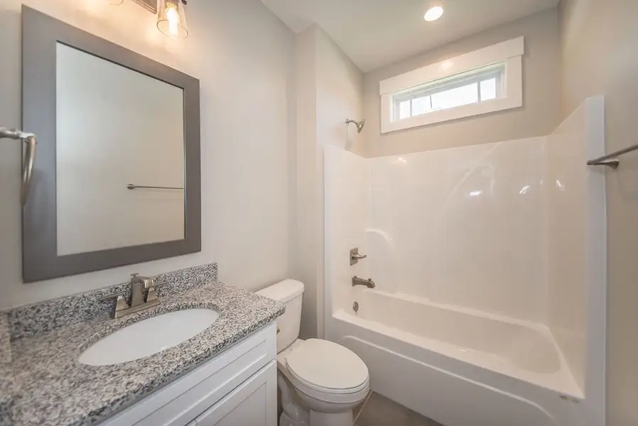 Representative furnished interior of a home built from the Beaumont Elite by Enchanted Homes in Smokey Hills, Campobello (Image 6).