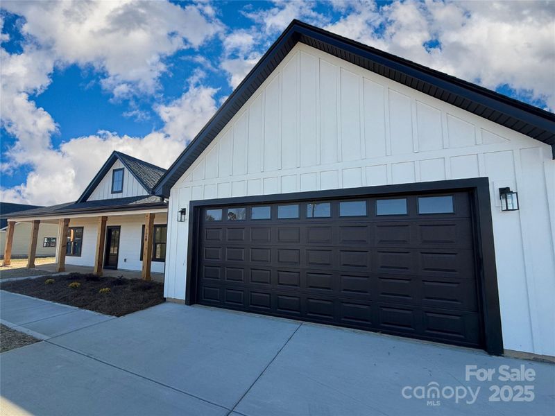 Front exterior of a new home in , Crouse, NC, highlighting curb appeal (Image 1).