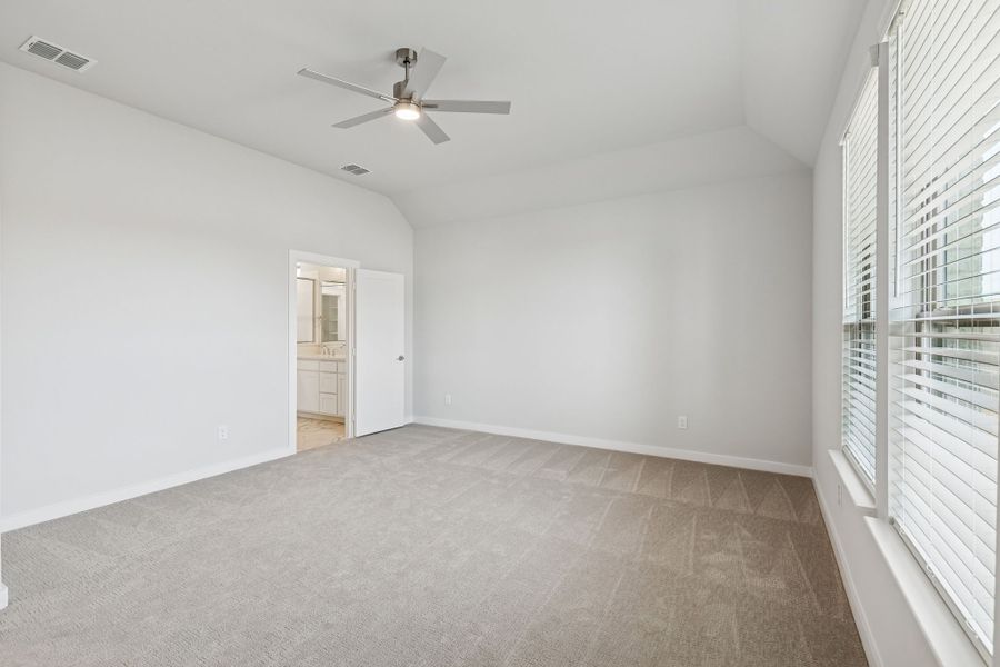 Primary Suite in the Stanley II home plan by Trophy Signature Homes – REPRESENTATIVE PHOTO