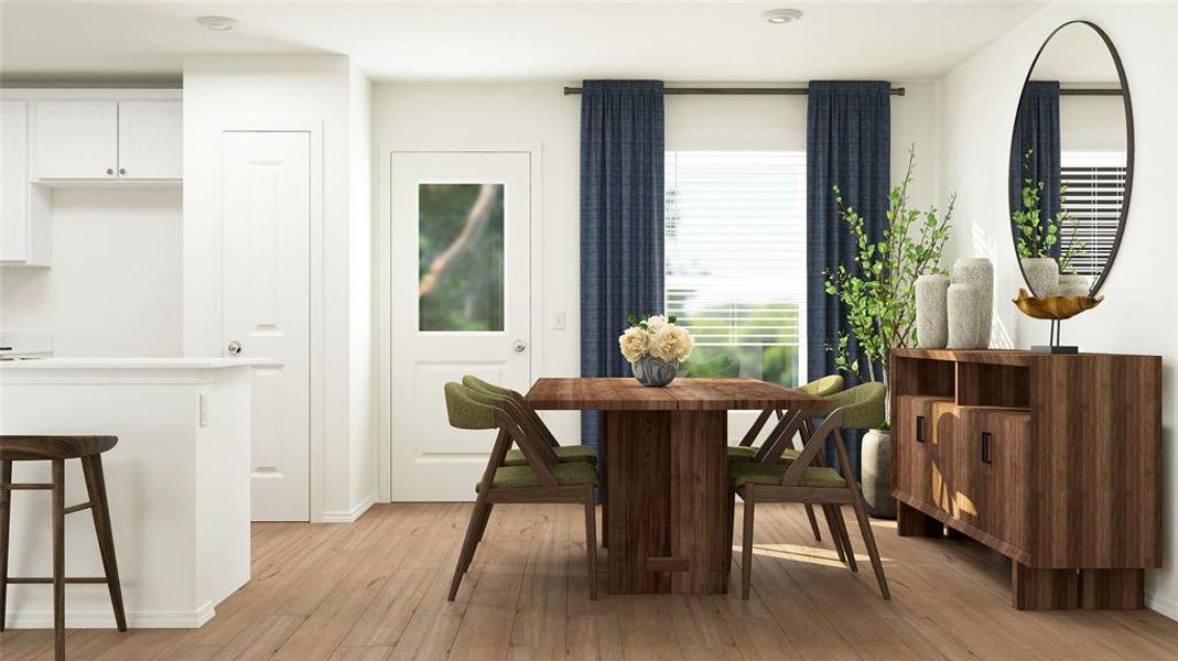 Dining room with light wood-type flooring