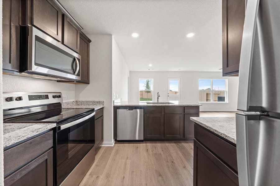 Furnished interior view inside a new home in Retreat at Fossil Creek, Fort Worth (Image 3). Furnished interior view inside a new home in Retreat at Fossil Creek, Fort Worth (Image 3).