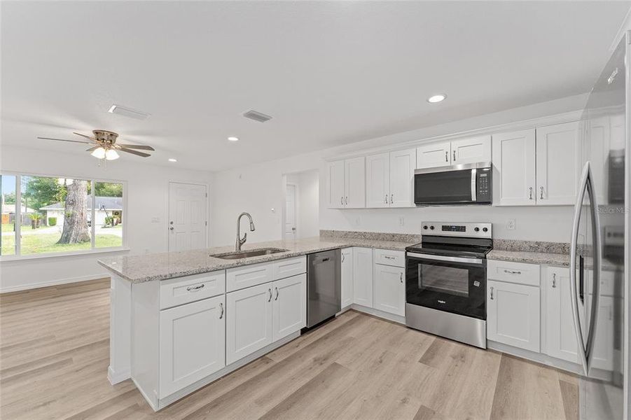 Furnished interior view inside a new home in , Ocklawaha (Image 14).