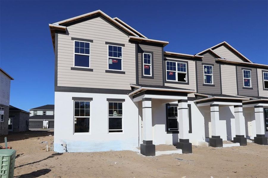 In-progress construction of a new home in Emerson Pointe, Apopka, FL (Image 8).