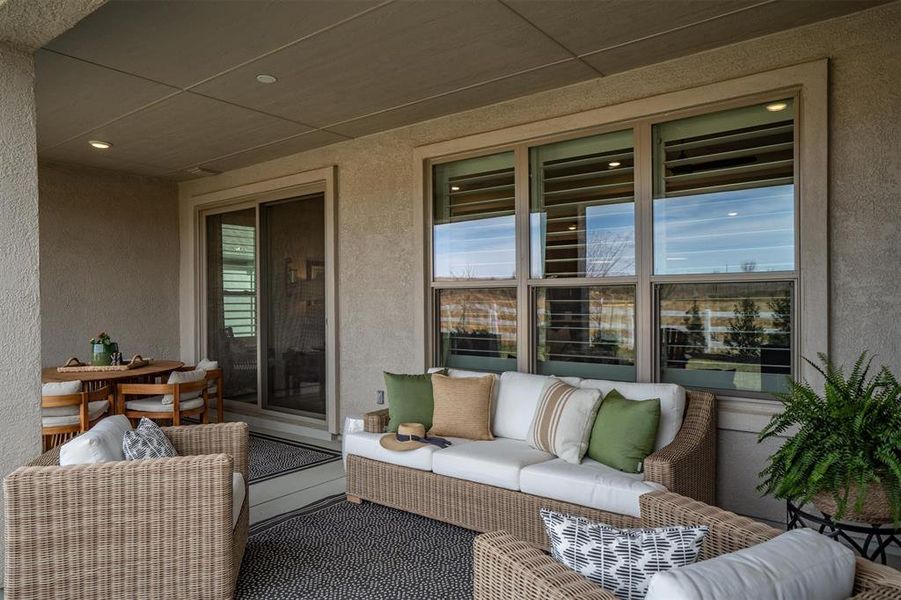 Exterior details and patio area of a home in Robson Ranch Texas, Denton (Image 21).