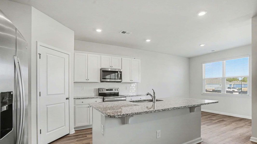 Furnished interior view inside a new home in Auberon Woods, Conway (Image 4).
