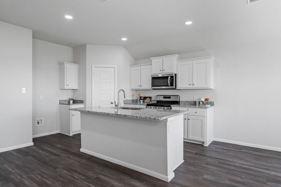 Representative furnished interior of a home built from the BELLVUE by D.R. Horton in Faculty Row, Abilene (Image 10).