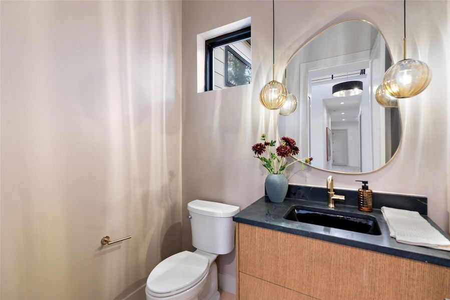 Powder bath near entry and main level office.