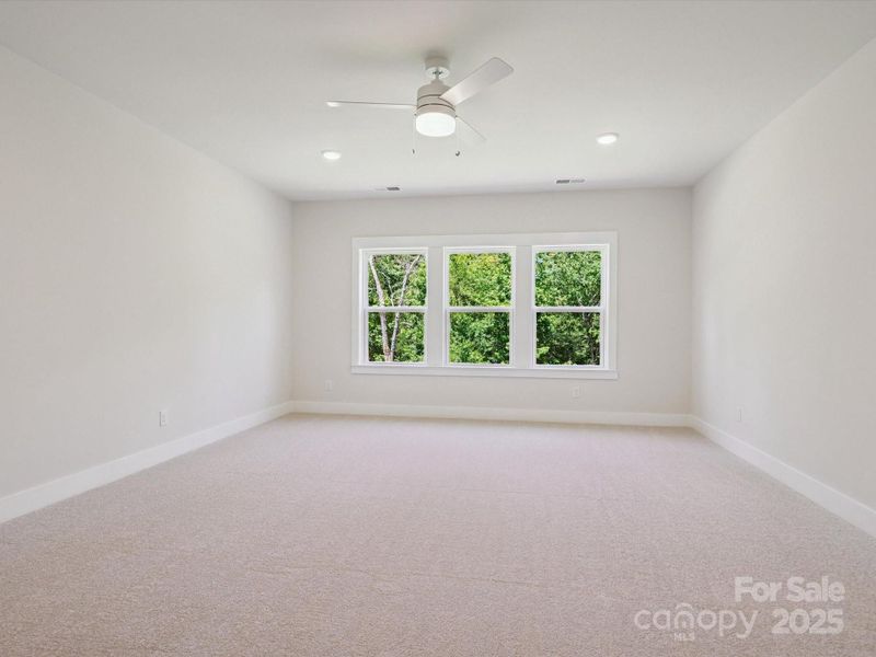 Spacious, unfurnished interior of a new home in North Creek Village, Huntersville (Image 21).