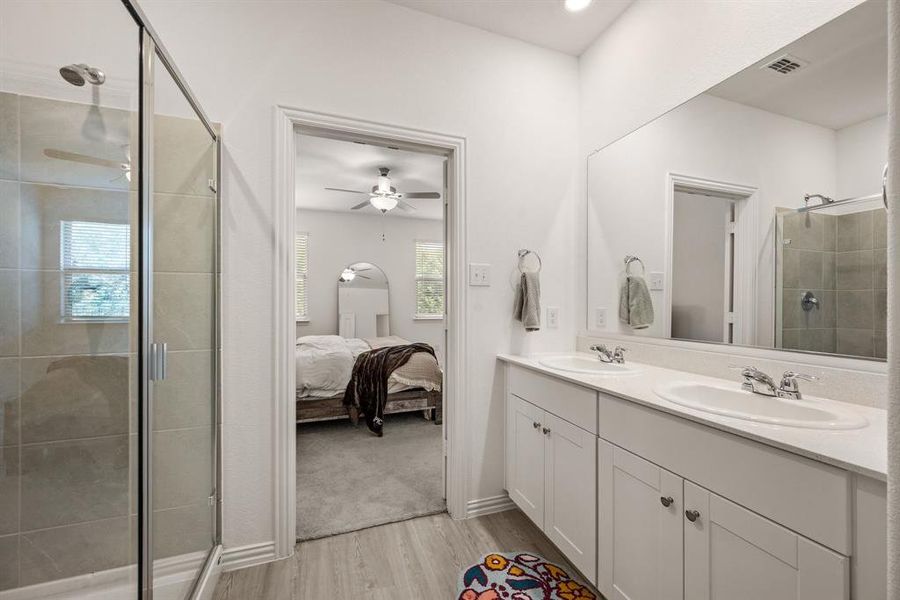 Furnished interior view inside a new home in Hurricane Creek: Classic 60s, Anna (Image 26). Furnished interior view inside a new home in Hurricane Creek: Classic 60s, Anna (Image 26).