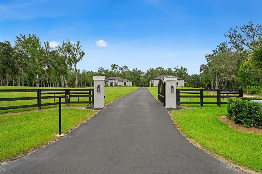 Front exterior of a new home in , Homosassa, FL, highlighting curb appeal (Image 28). Front exterior of a new home in , Homosassa, FL, highlighting curb appeal (Image 28).