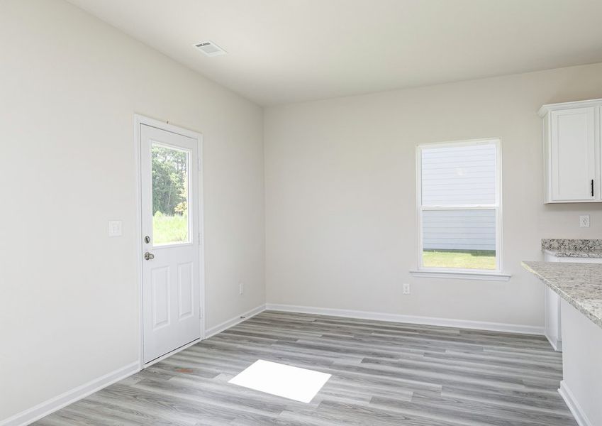 Enjoy breakfast with your family in this bright dining area