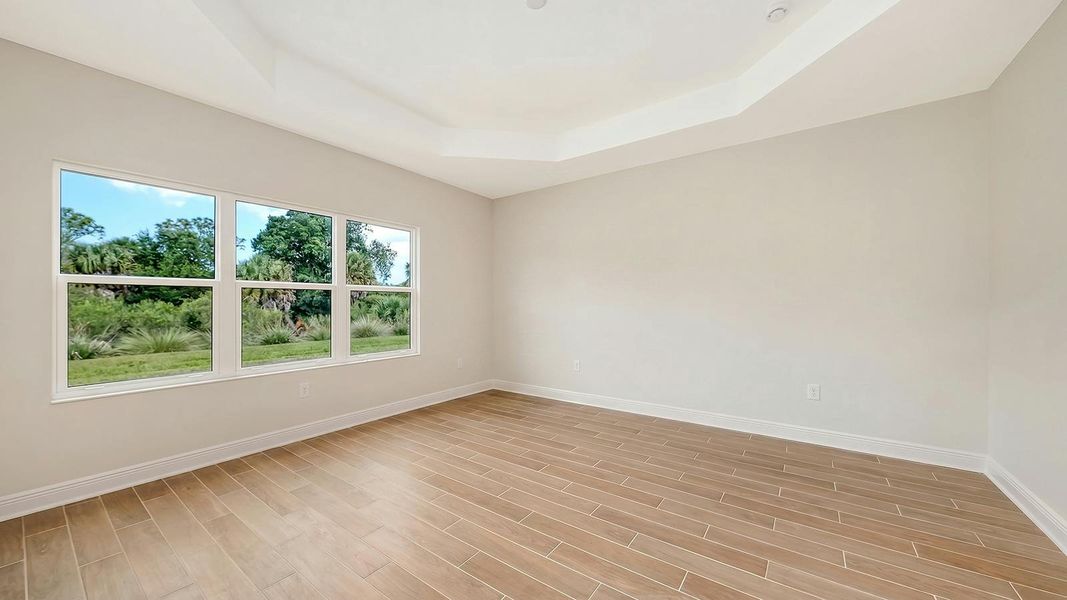 Spacious, unfurnished interior of a new home in Grand Park Real Estate and Homes for Sale in Sarasota, FL - Neal Communities, Sarasota (Image 39).