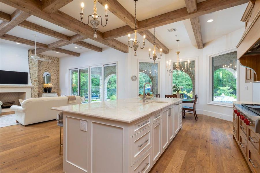 Eat in kitchen area with large center island with breakfast bar with Quartzite countertops, extra storage cabinets under bar area. Eat in kitchen area with large center island with breakfast bar with Quartzite countertops, extra storage cabinets under bar area.