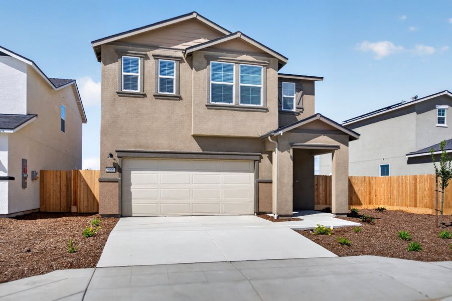 A house with a garage. A house with a garage.