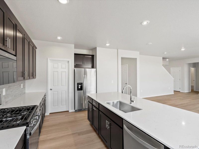 Furnished interior view inside a new home in Poudre Heights: The Alpine Collection, Windsor (Image 11).