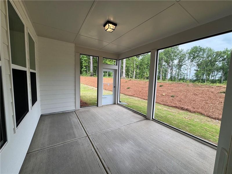 Exterior details and patio area of a home in Rosewood Lake Preserve, Hoschton (Image 23).