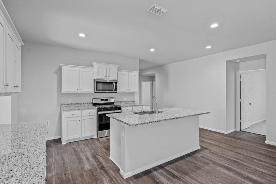 Representative furnished interior of a home built from the KINGSTON by D.R. Horton in Faculty Row, Abilene (Image 17).