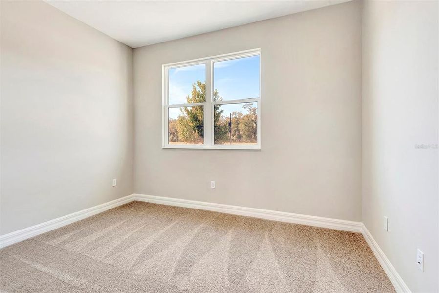 Spacious, unfurnished interior of a new home in The Reserve at Victoria, Deland (Image 26).