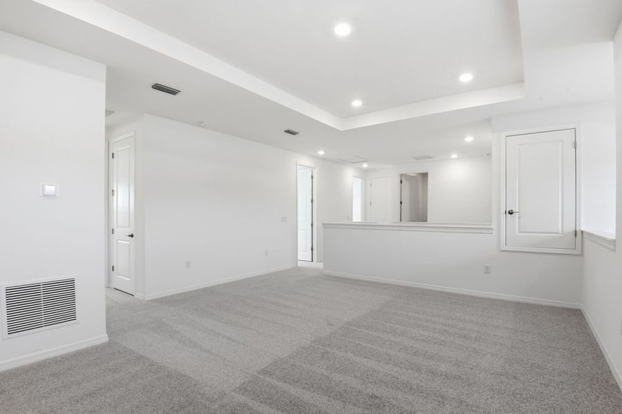 Representative unfurnished interior of a home built from the Barbados by Taylor Morrison in Ardisia Park, New Smyrna Beach (Image 17).