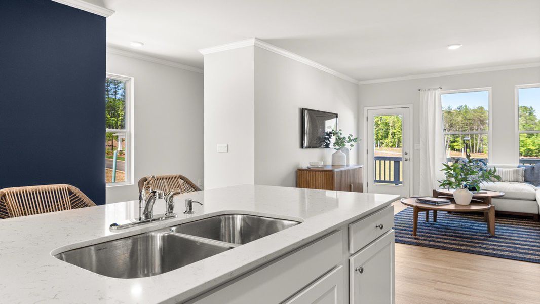 Representative furnished interior of a home built from the ADDINGTON by D.R. Horton in Waypoint, Flowery Branch (Image 8).