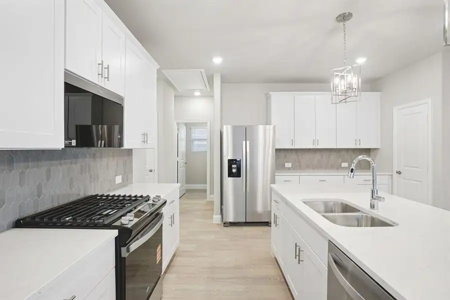 Furnished interior view inside a new home in Parks at Foster Crossing - Spring Series, Anna (Image 8).