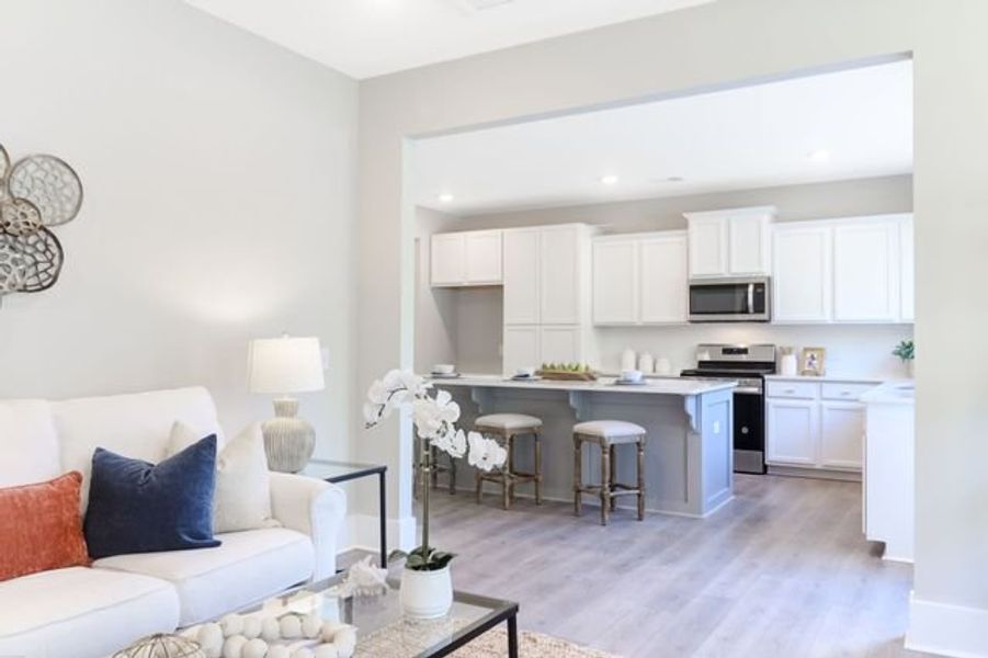 Representative furnished interior of a home built from the Inverness P by True Homes in Homecoming, Ravenel (Image 7).