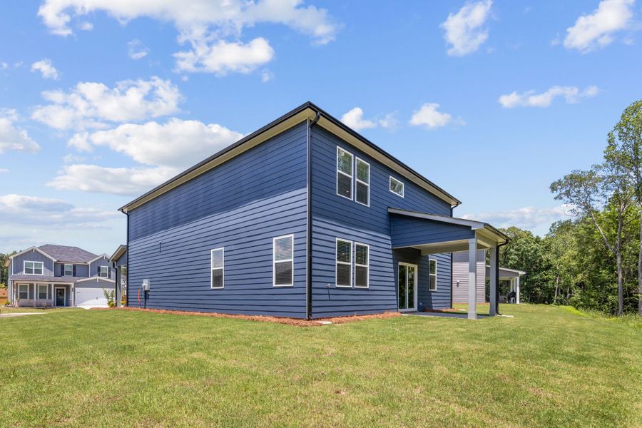 A house with a grass yard. A house with a grass yard.
