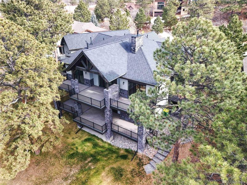 Front exterior of a new home in , Castle Rock, CO, highlighting curb appeal (Image 1).