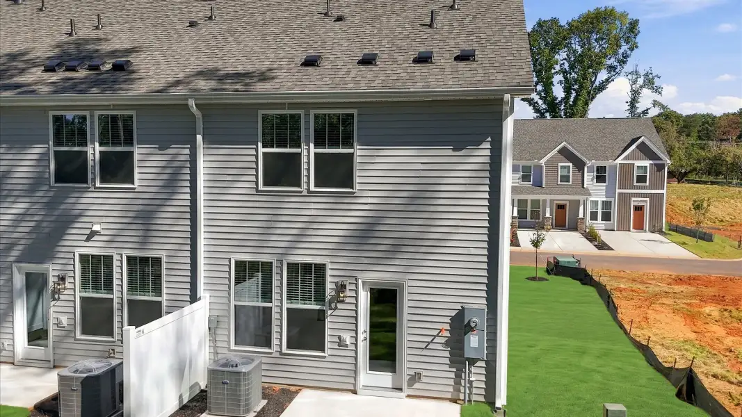 Eye-catching rear exterior with timeless color palette and superior architectural detail near Lake Hartwell
