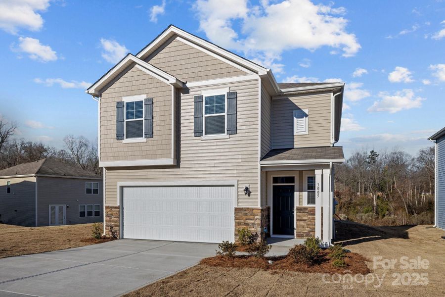 Front exterior of a new home in , Charlotte, NC, highlighting curb appeal (Image 19).