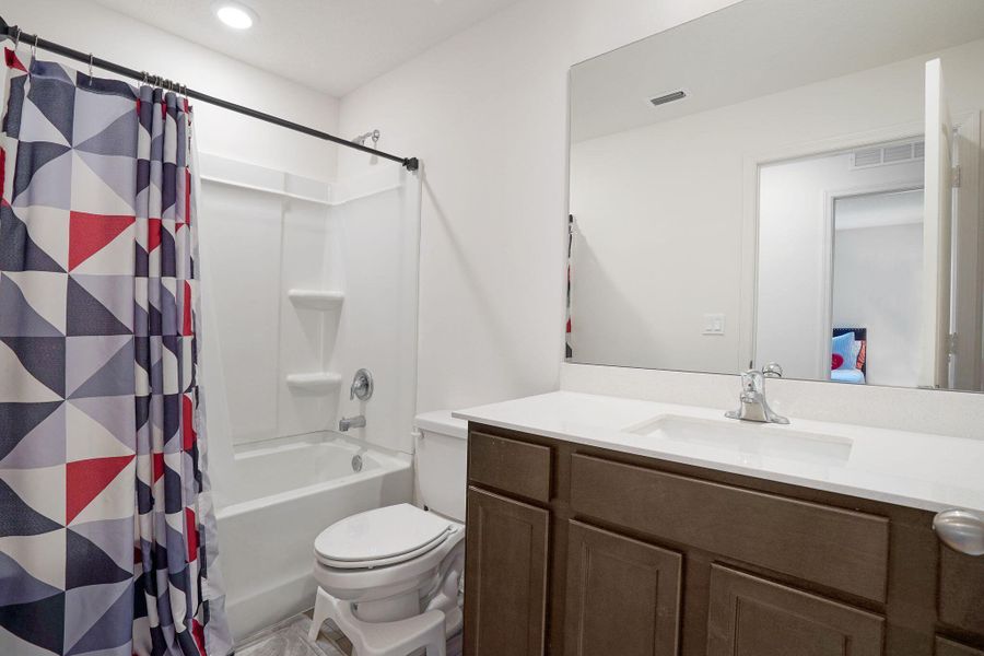 Furnished interior view inside a new home in Celebration Pointe, Fort Pierce (Image 5).