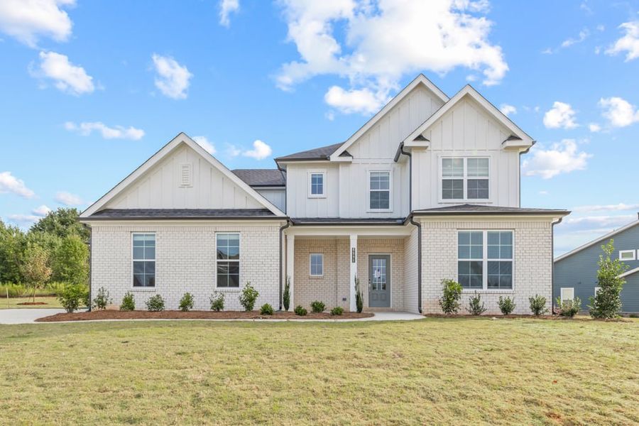 Front exterior of a new home in Conner Farm, Dawsonville, GA, highlighting curb appeal (Image 1).