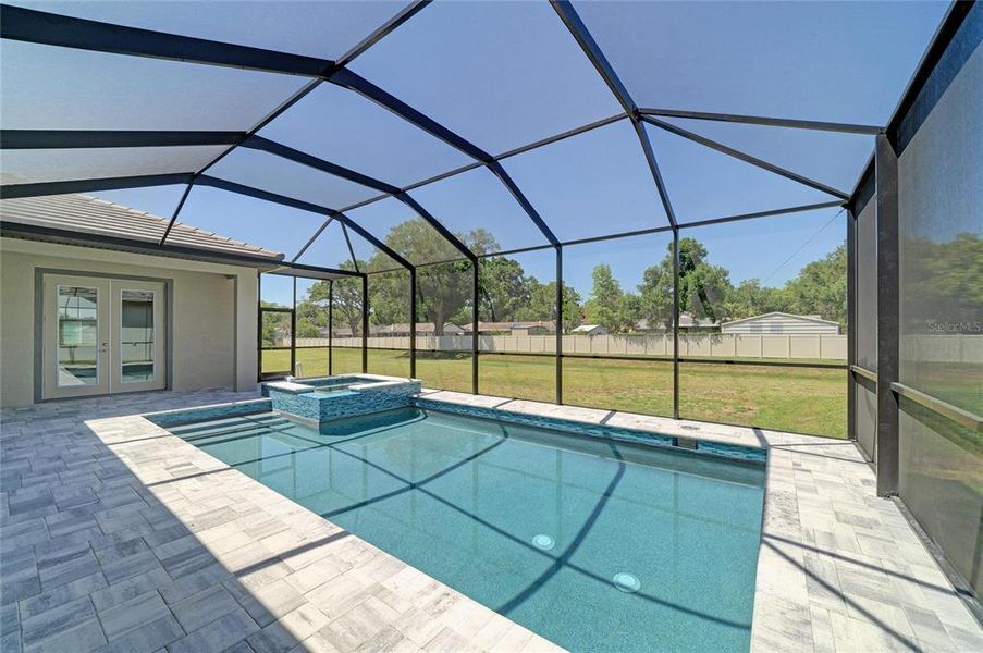 Exterior details and patio area of a home in Hidden Lakes, Brandon (Image 27).