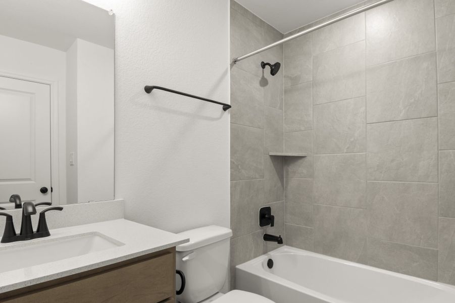 Furnished interior view inside a new home in Trace, San Marcos (Image 38).