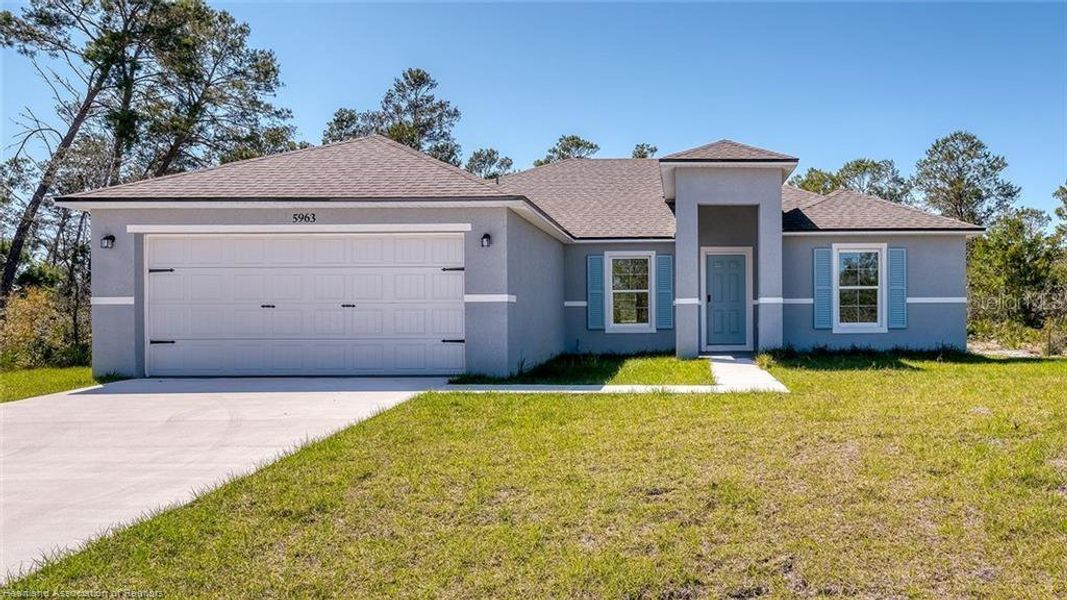 Front exterior of a new home in , Sebring, FL, highlighting curb appeal (Image 1). Front exterior of a new home in , Sebring, FL, highlighting curb appeal (Image 1).