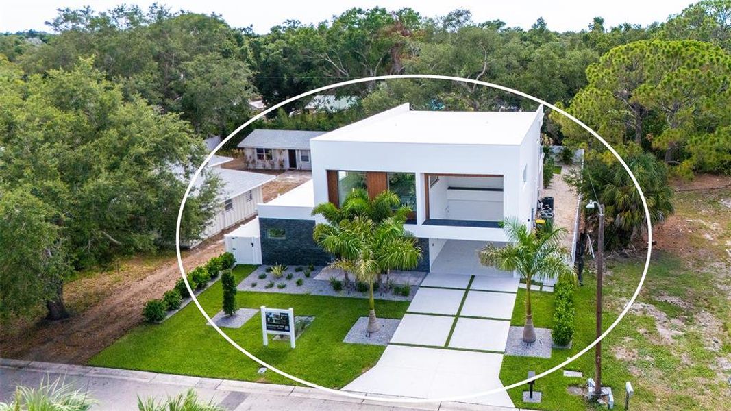 Front exterior of a new home in , Sarasota, FL, highlighting curb appeal (Image 25).
