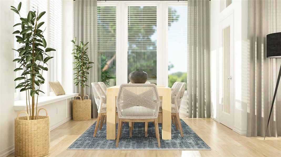 Dining space featuring light hardwood / wood-style flooring