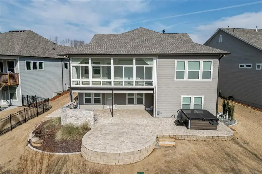 Exterior details and patio area of a home in The Retreat at Sterling on the Lake 48', Flowery Branch (Image 4).