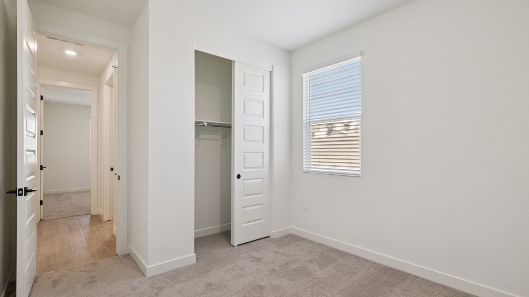 Spacious, unfurnished interior of a new home in The Ridge at Stone Butte, Phoenix (Image 27).
