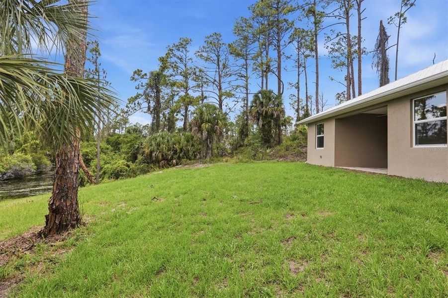 Exterior details and patio area of a home in , North Port (Image 27).