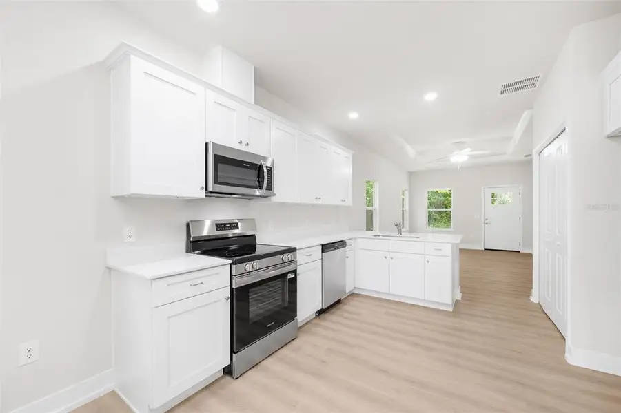 Furnished interior view inside a new home in , High Springs (Image 5).