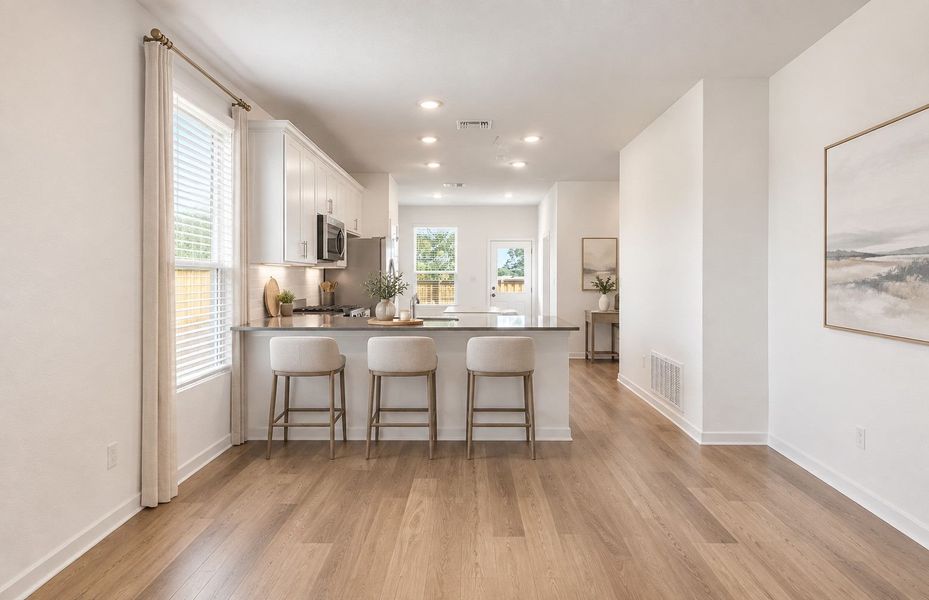 Representative furnished interior of a home built from the Taft by Pulte Homes in Crosswinds, Kyle (Image 8).