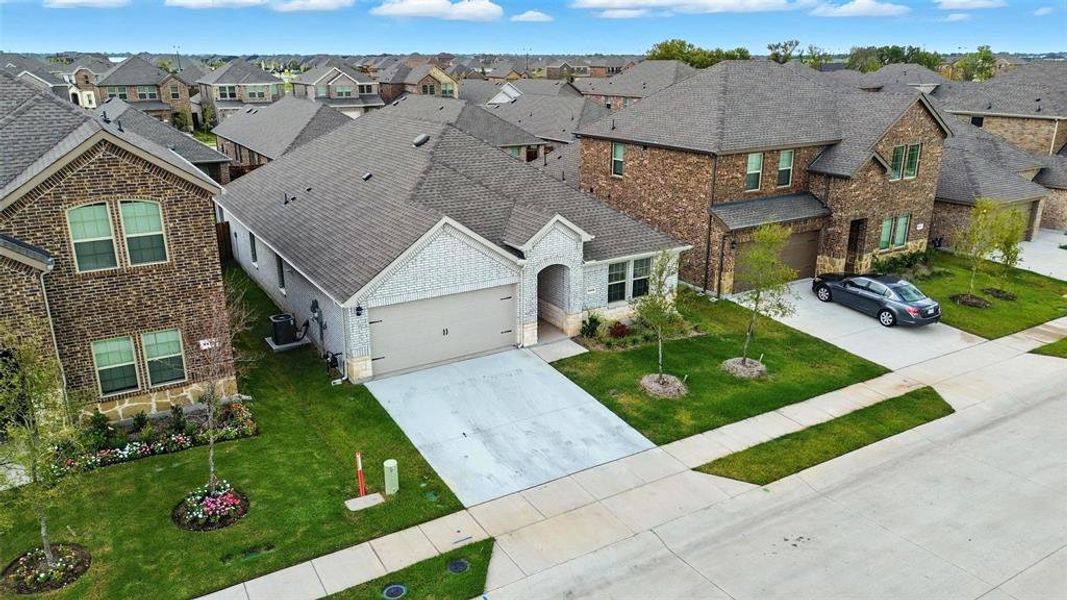 Front exterior of a new home in , Princeton, TX, highlighting curb appeal (Image 15).